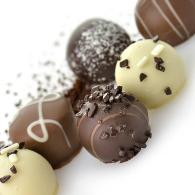 Chocolate candies assortment on white background