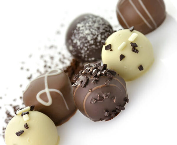 Chocolate candies assortment on white background